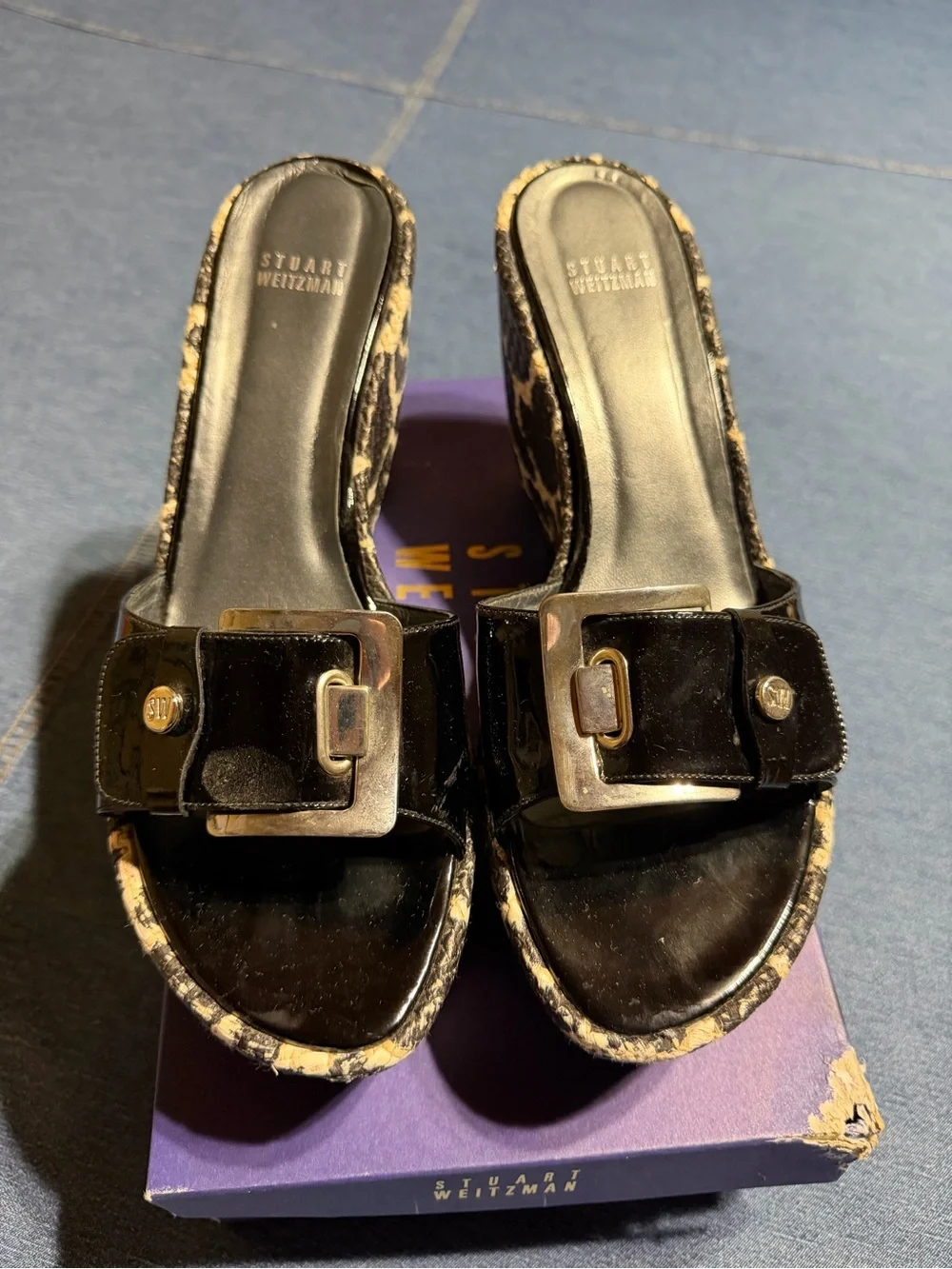 Stuart Weitzman Black Patent Buckle sandals.
